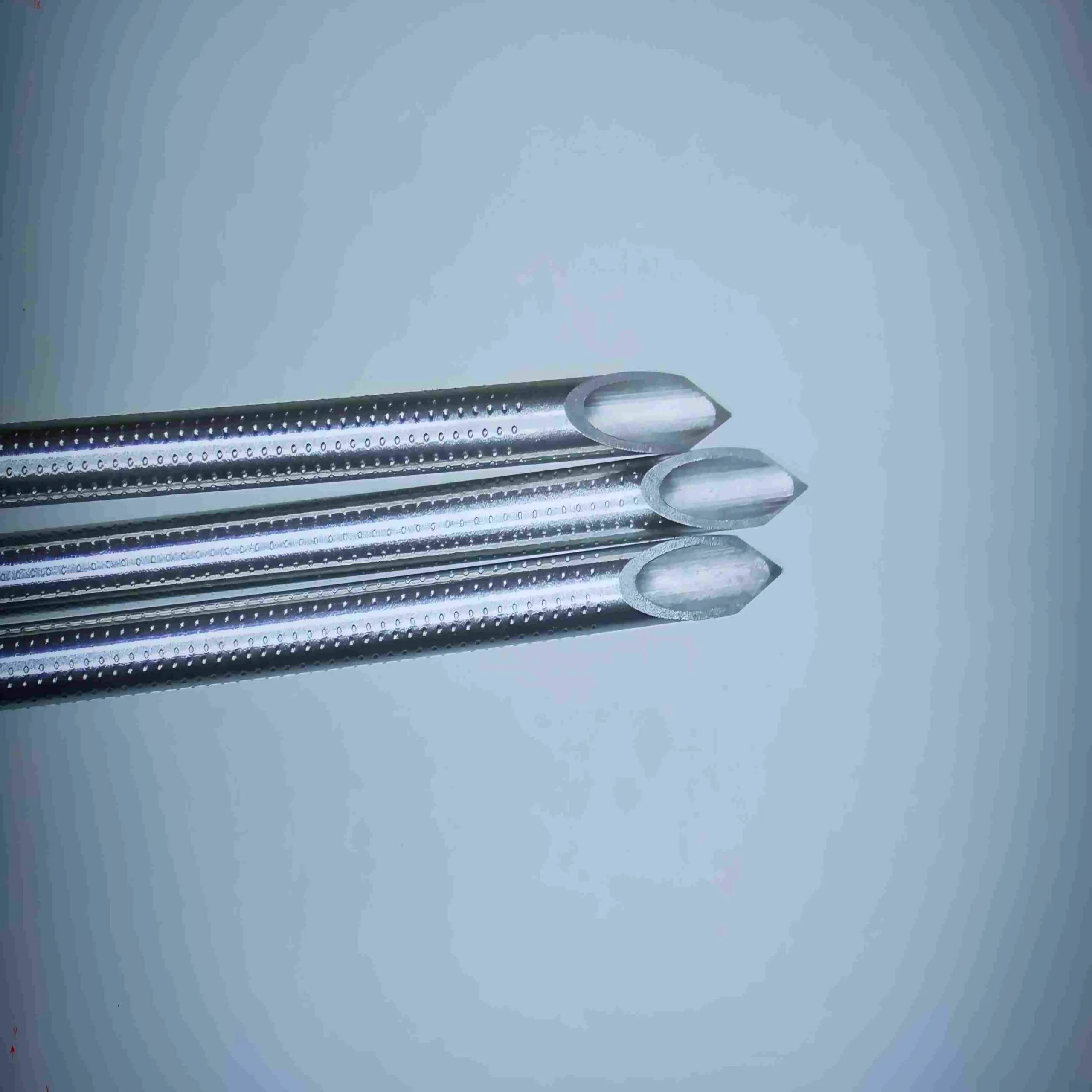 precision Nitinol hypotubes for medical devices, showing laser-cut patterns and ultra-smooth surface finish
